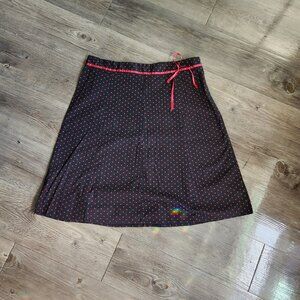 A-line black skirt with red dots